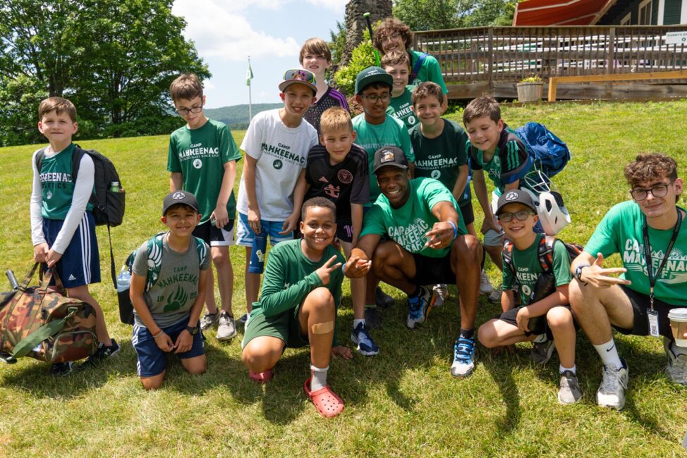 group of campers smiling for the camera